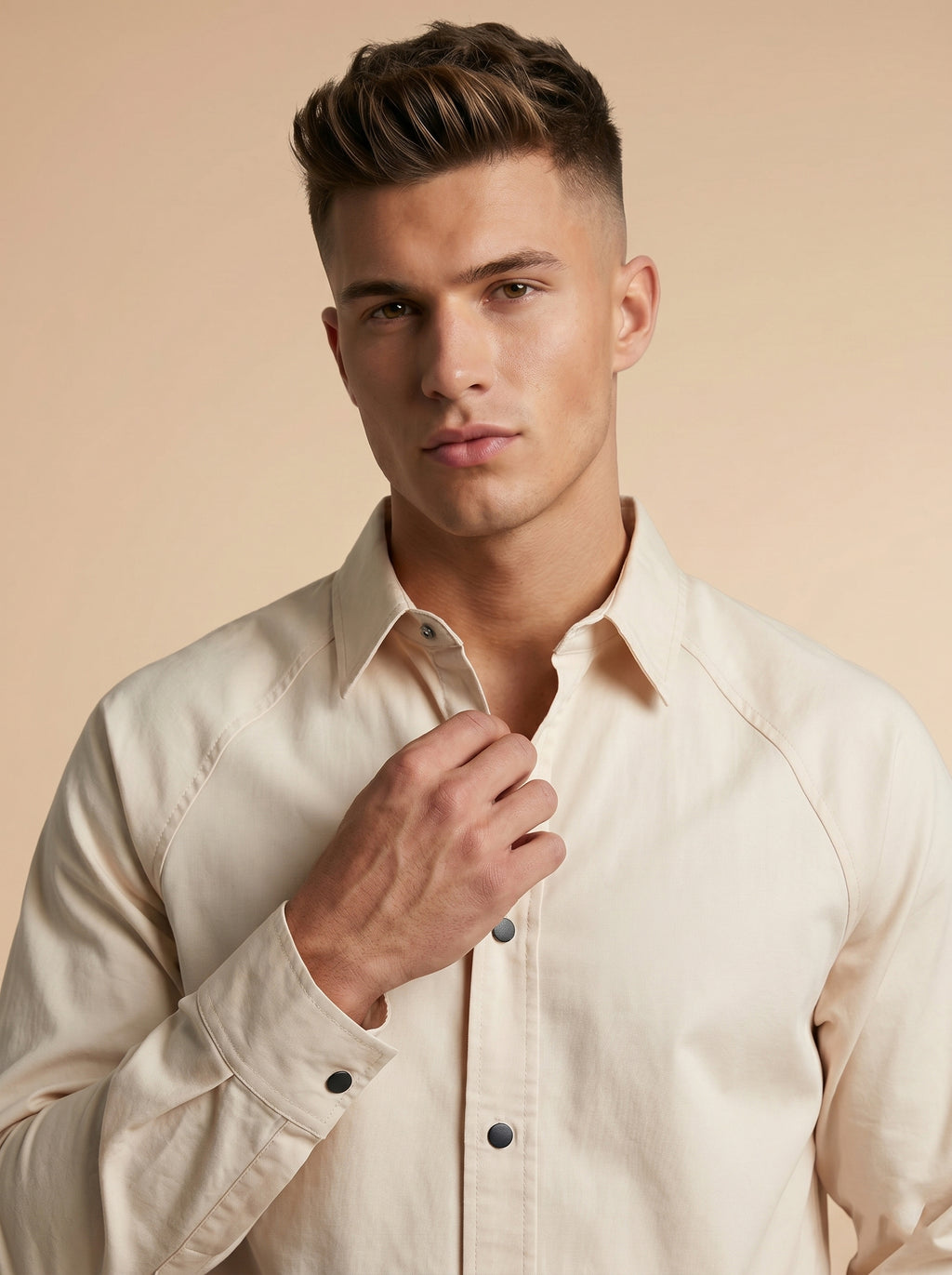 Snipes shacket shirt in neutral fabric with button front and collar, displayed on a hanger against a plain background.