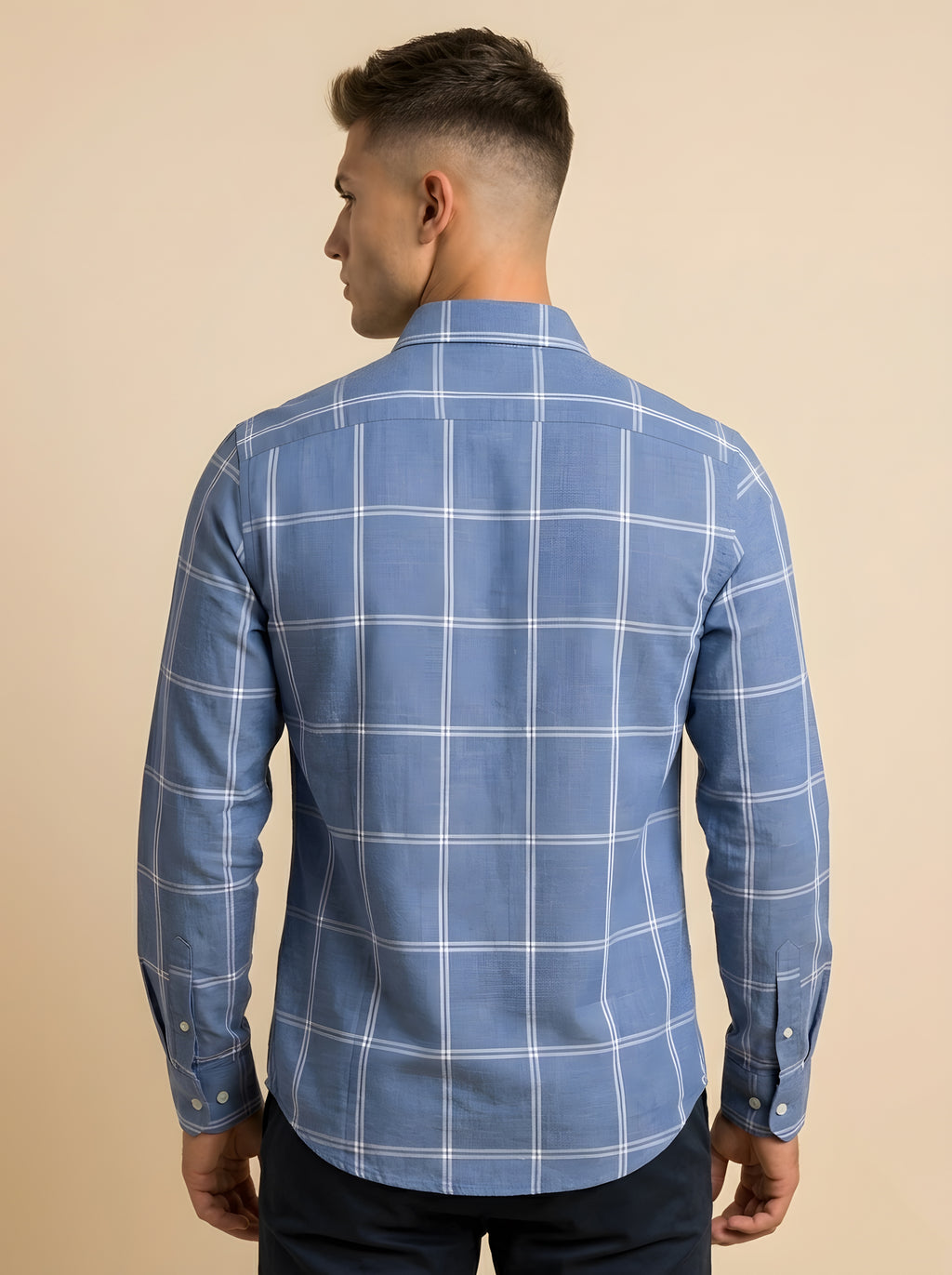 Blue and white checked shirt from Snipes with a classic striped pattern, displayed on a hanger.