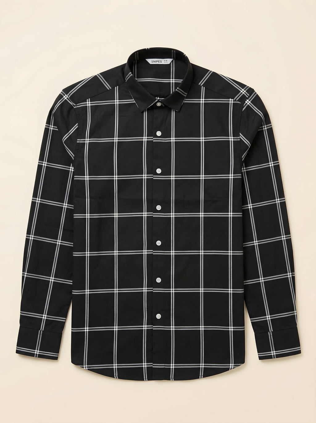Snipes checked shirt featuring a classic plaid pattern, long sleeves, and a button-up front, perfect for casual wear.