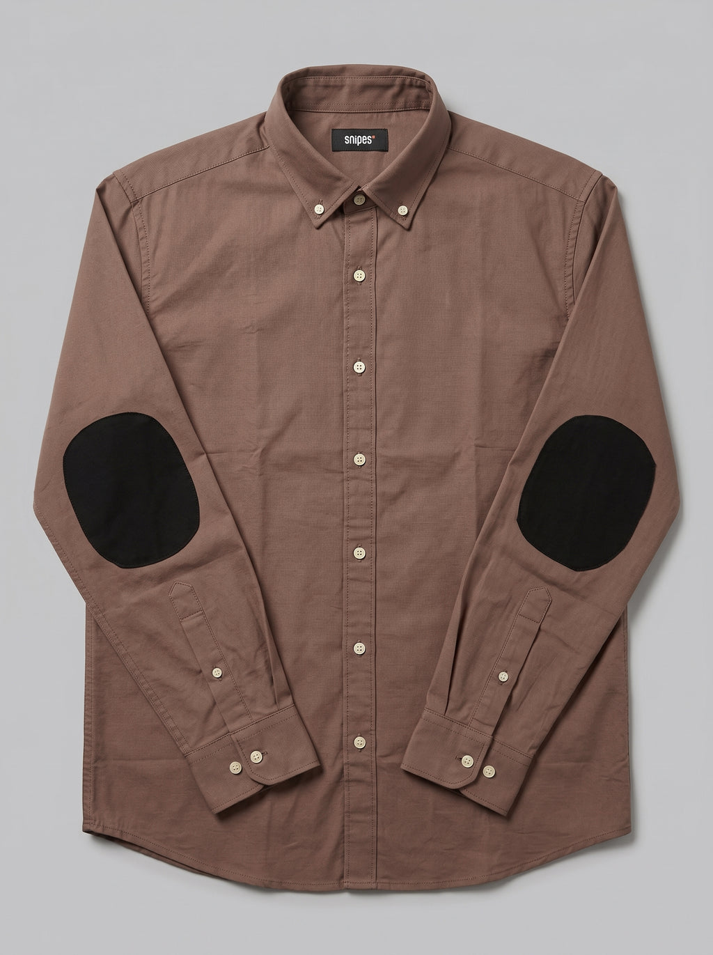 Snipes men's elbow patch shirt featuring a casual design with contrasting elbow patches and a button-down collar.