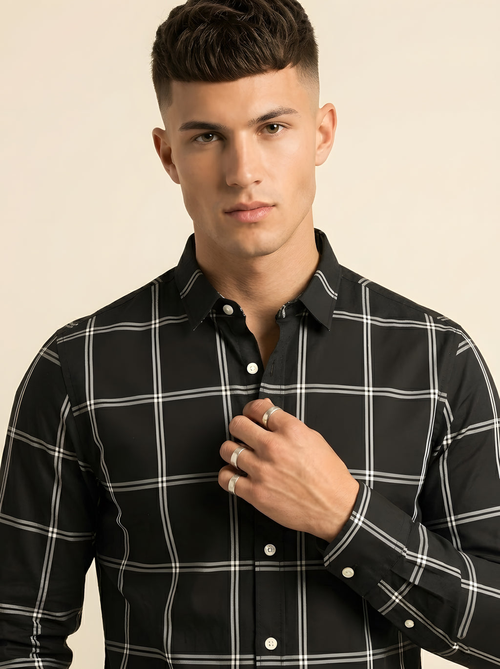 Snipes checked shirt with blue and white plaid pattern, long sleeves, and button-front design.