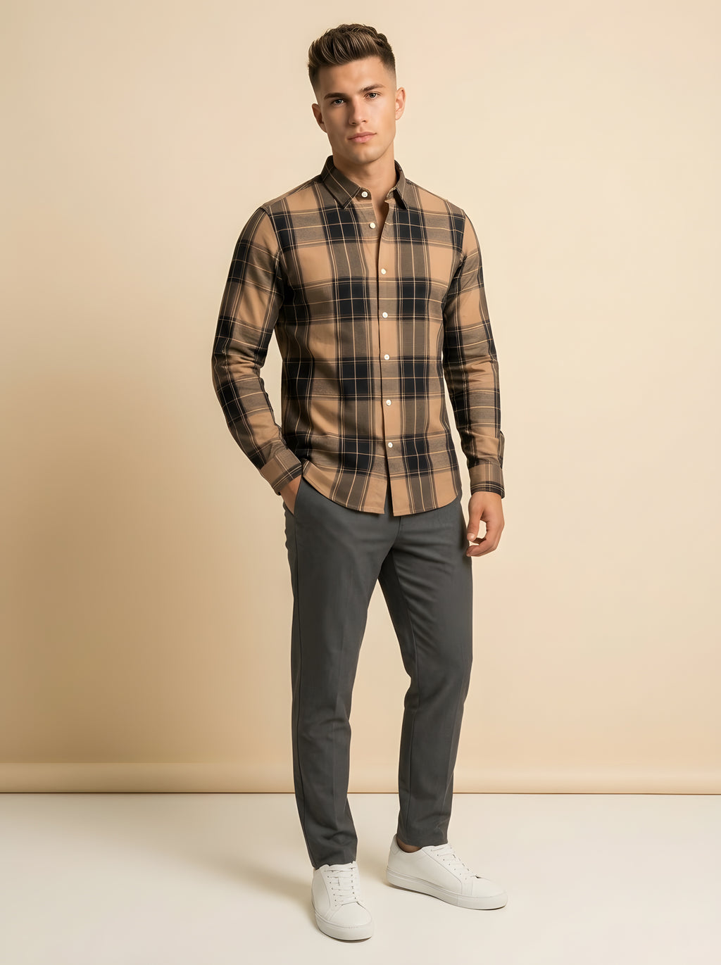 Snipes checked shirt featuring a classic pattern, button-up front, and collar, displayed on a hanger against a neutral background.