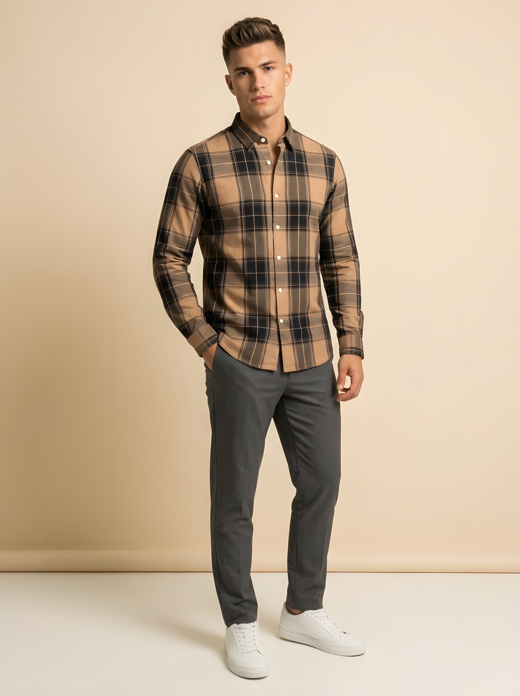 Snipes checked shirt featuring a classic pattern, button-up front, and collar, displayed on a hanger against a neutral background.