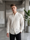 Snipes linen button-down shirt displayed on a hanger, showcasing lightweight, breathable fabric and classic collar design.