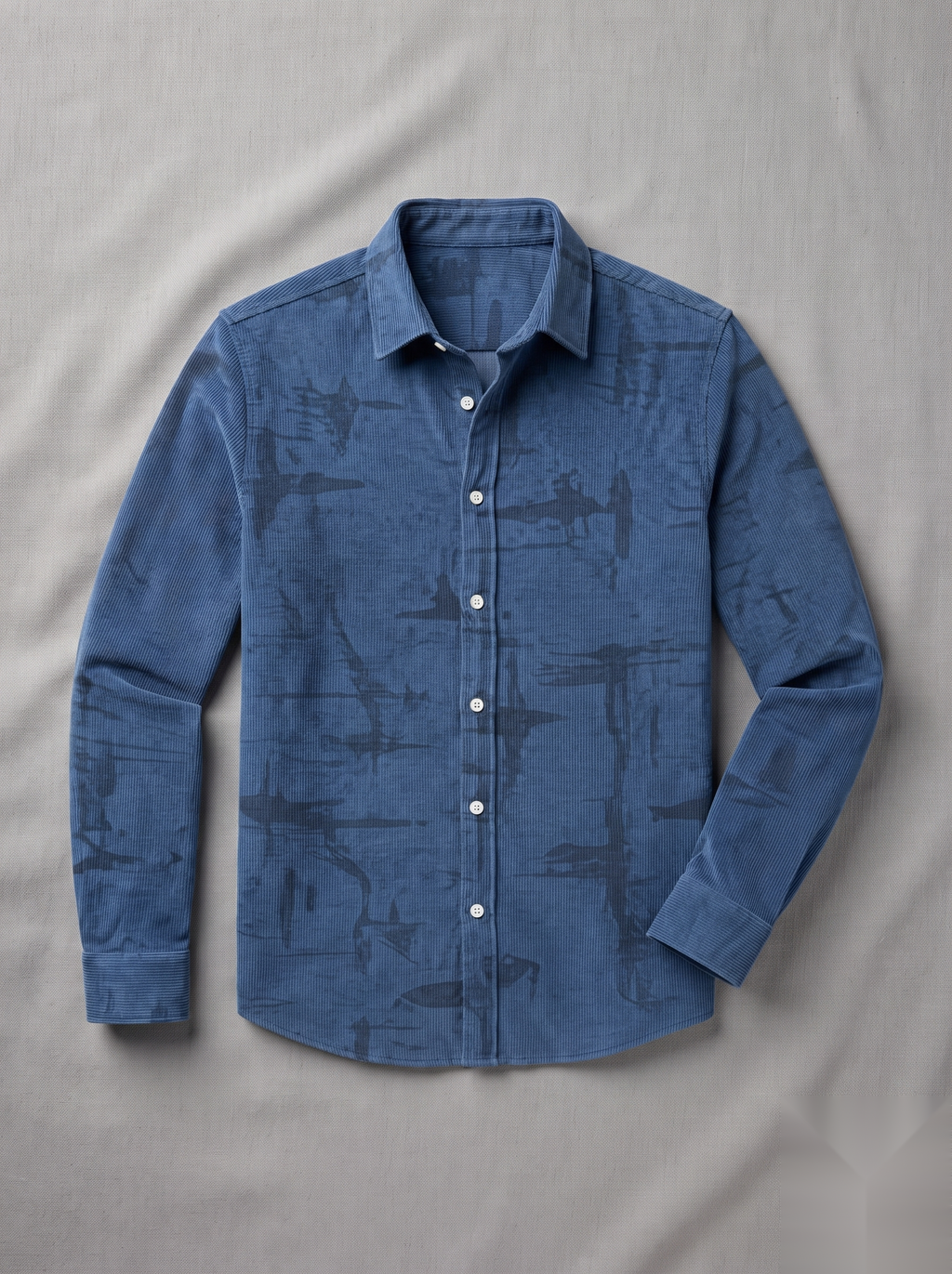 Snipes corduroy printed shirt with colorful pattern, long sleeves, and button-up front, displayed on a hanger.
