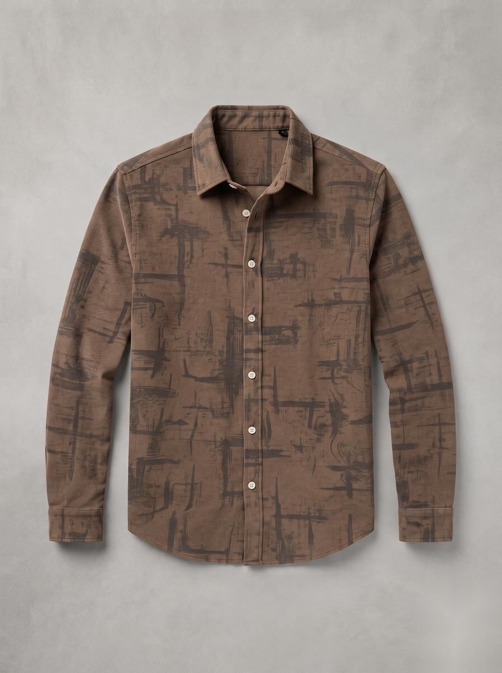 Snipes corduroy printed shirt with colorful pattern, long sleeves, and classic collar, displayed on a hanger.