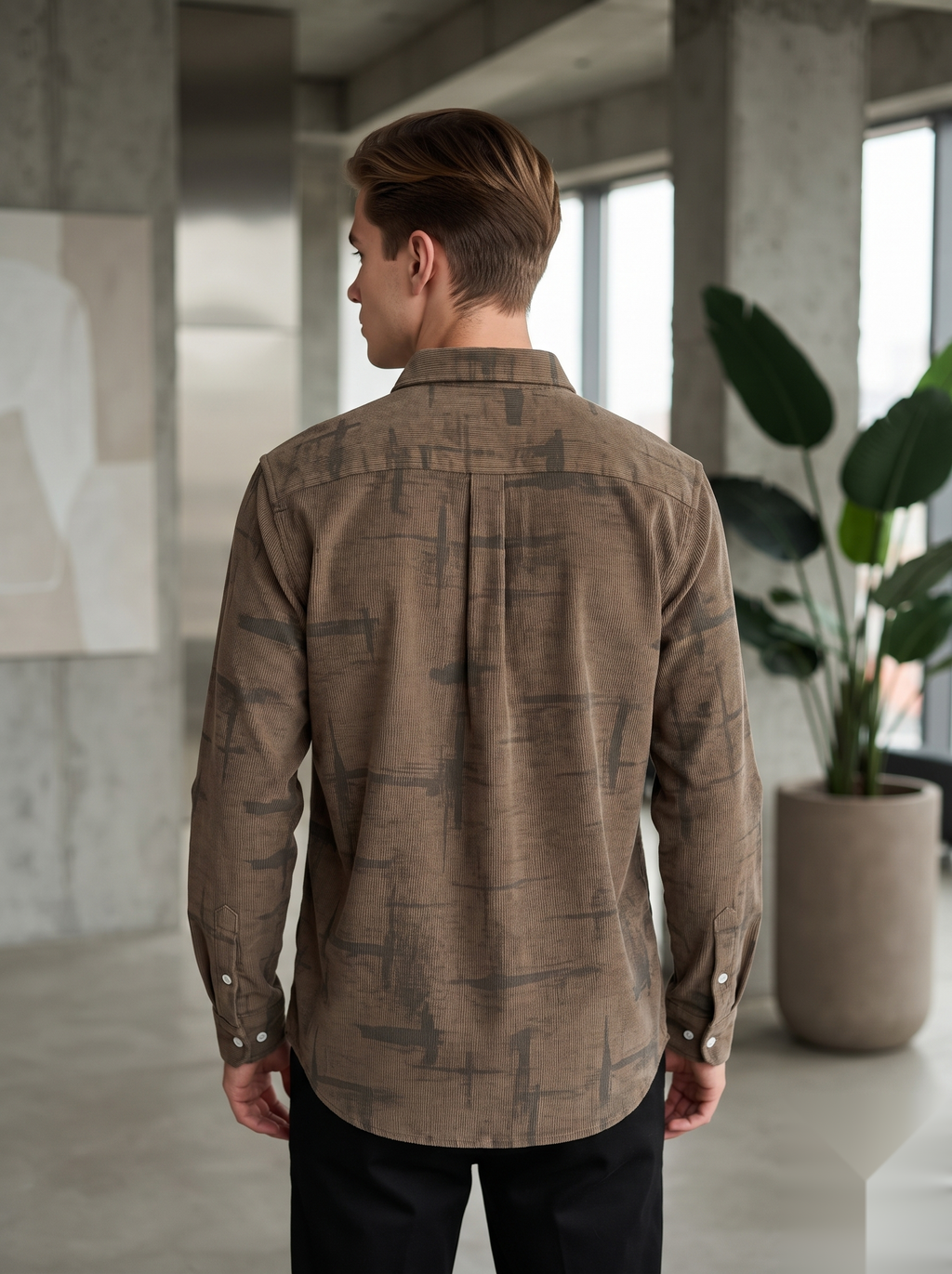 Snipes corduroy printed shirt featuring a colorful pattern, long sleeves, and a classic collar on a plain background.