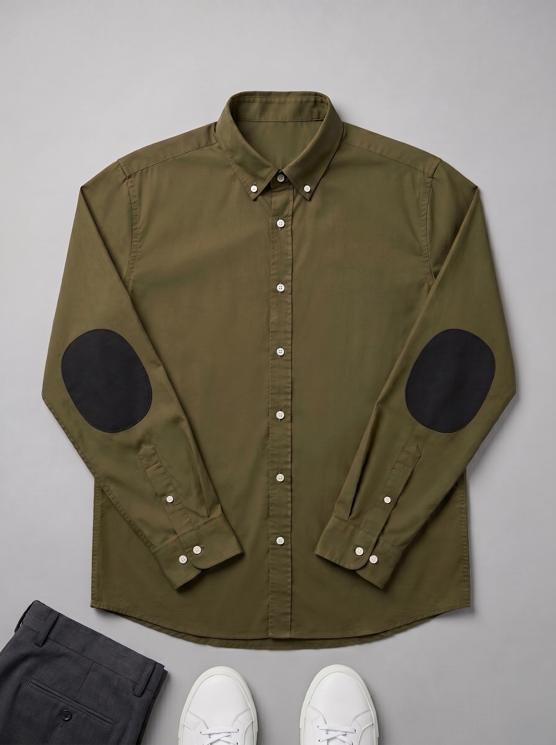 Snipes elbow patch shirt featuring a classic button-up design with contrasting fabric patches on the elbows.