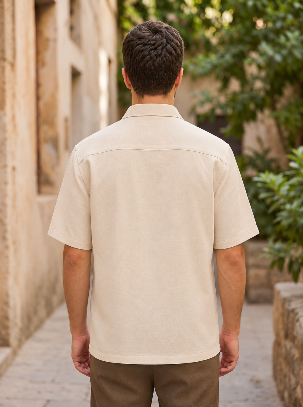 Snipes men's boxy fit embroidered shirt photographed in a sunlit stone alley