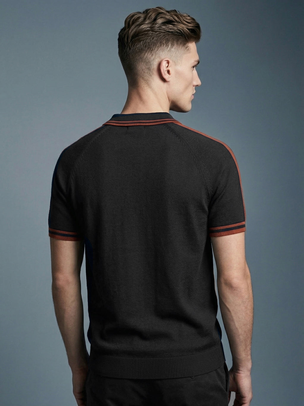 Back view of a navy Snipes premium polo T-shirt showing classic collar and short sleeves, made from soft cotton fabric.