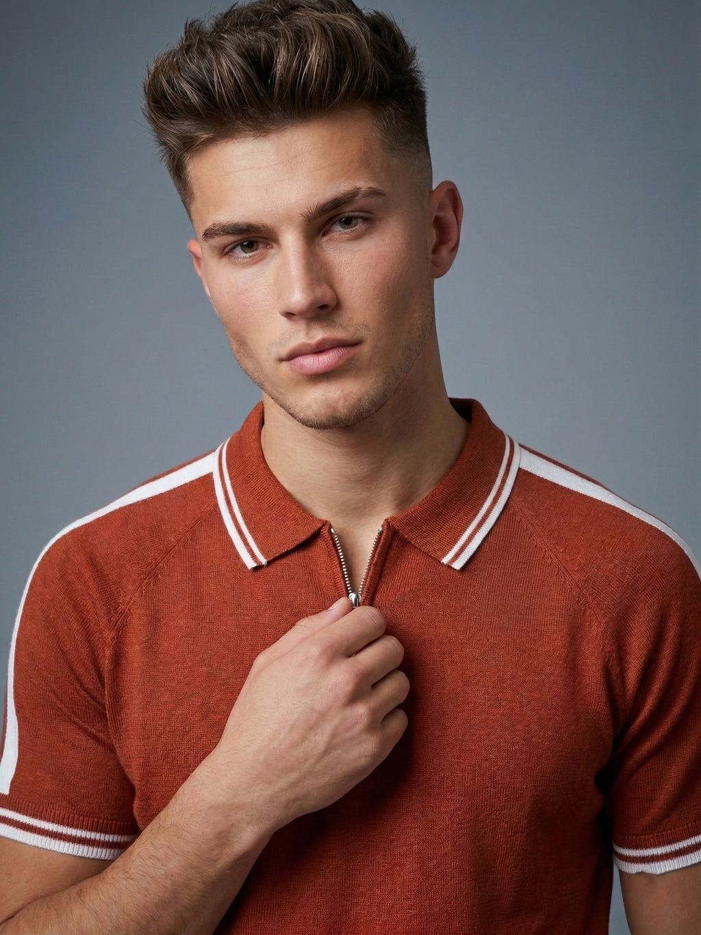 Close-up of a Snipes premium polo T-shirt showing the collar, fabric texture, and subtle branding details.