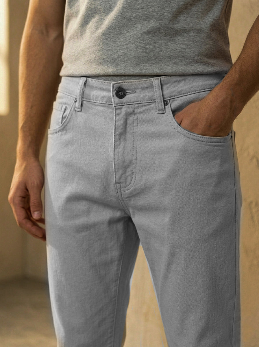 Snipes mom fit denim jeans shown in the image with classic blue wash and relaxed, high-waisted design.